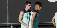 <p>Ao lado de Messi, Neymar realizou nesta segunda-feira o primeiro treino pelo Barcelona; jogo será na sexta, pelo Troféu Joan Gamper</p>  Foto: Reuters