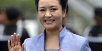 <p>Sem Michelle Obama na lista, a pol&iacute;tica est&aacute; representada na lista das mais bem vestidas da <em>Vanity Fair</em> pela primeira-dama chinesa&nbsp;Peng Liyuan&nbsp;</p>  Foto: AFP