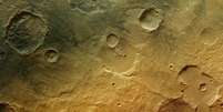 <p>Imagem mostra cratera em Marte</p>  Foto: EFE