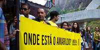 <p>Ato na favela da Rocinha, no Rio de Janeiro,&nbsp;pede informa&ccedil;&otilde;es sobre o paradeiro de Amarildo de Souza</p>  Foto: Reynaldo Vasconcelos / Futura Press