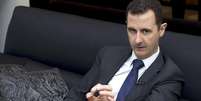 <p>Presidente sírio, Bashar al-Assad, fala durante entrevista a um jornal alemão, em Damasco</p>  Foto: SANA / Reuters
