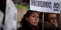 Manifestante espanhola protesta contra especulação imobiliária, uma das causas da crise  Foto: Getty Images 
