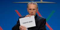 Jacques Rogge, presidente do COI, anuncia vitória de Tóquio  Foto: AP