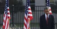 <p>Obama em prece durante homenagem a v&iacute;timas do ataque de 11 de Setembro de 2001</p>  Foto: Gary Cameron / Reuters