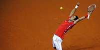 Djokovic cumpriu sua missão no duelo contra os canadenses e deixa decisão para o quinto jogo  Foto: AFP