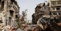 Ruínas de Aleppo, a maior cidade da Síria, em foto de grupo da oposição, feita no dia 19 de setembro  Foto: AP