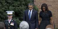 Barack e Michelle Obama, durante o ato de homenagem &agrave;s v&iacute;timas de mais um ataque com armas de fogo nos EUA  Foto: AP