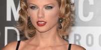 A cantora Taylor Swift escolheu uma maquiagem ousada para o Video Music Awards 2013   Foto: Getty Images 