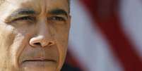 Presidente dos EUA, Barack Obama, fotografado durante pronunciamento sobre o novo programa de sa&uacute;de do governo, na Casa Branca, em Washington. Obama cancelou parte de uma viagem h&aacute; tempos planejada para a &Aacute;sia e deixou o restante do percurso em suspenso, nesta quarta-feira, &agrave; medida que o governo dos EUA entra no segundo dia de uma paralisa&ccedil;&atilde;o sem um final &agrave; vista para o impasse no Congresso. 1/10/2013.  Foto: Larry Downing / Reuters