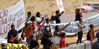 <p>Manifestantes invadem Arena Pantanal para realizar protesto em dia de visita da Fifa</p>  Foto: Euclides Oltramari Jr. / Futura Press