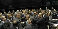 Deputados discutem durante votação da Medida Provisória que estabelece o programa Mais Médicos  Foto: Luis Macedo / Agência Câmara