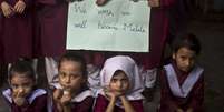 <p>"N&oacute;s desejamos ser Malala", diz o cartaz de alunos de uma escola da cidade de&nbsp;Rawalpindi</p>  Foto: AP
