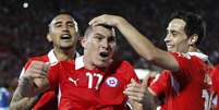 Com vitória sobre Equador, chilenos foram a 28 pontos e terminaram em terceiro  Foto: Reuters