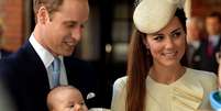 William e Kate batizam o seu filho George  Foto: AP