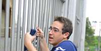 <b>S&atilde;o Paulo - </b>O estudante Flavio Renato Queiros chegou atrasado para a prova do segundo dia do Exame Nacional do Ensino M&eacute;dio (Enem) 2013, na Uninove da Barra Funda, em S&atilde;o Paulo  Foto: Rodrigo Milan / Futura Press