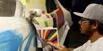 <p>Grafiteiro Eduardo Kobra foi o escolhido para apresentar sua arte na 36ª edição do SPFW</p>  Foto: Ricardo Matsukawa / Terra