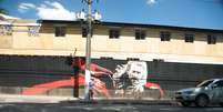 Novos grafites chegaram aos muros da capital paulista, desta vez inspirados no filme 'Thor: O Mundo Sombrio', que é baseado na história da Marvel que chega aos cinemas do Brasil nesta sexta-feira (1º). A intervenção artística, que é parte do projeto Urban Gallery, da Brookfield, ocupa uma área de 255 metros na Avenida das Nações Unidas, próxima à ponte João Dias. O trabalho é assinado pelo coletivo de arte ZZ7ZZ, composto por Simone Sapienza SISS e Celso Gitahy  Foto: Katia Lombado / Divulgação