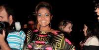 Gaby Amarantos conferiu o desfile de Ronaldo Fraga em 2013 com um <i>look</i> bem colorido  Foto: Paduardo / AgNews