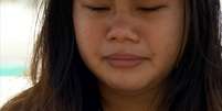 Elfie Batista, de 19 anos, é uma das sobreviventes na cidade de Guiuan, a primeira a ser atingida na passagem do tufão Haiyan  Foto: BBC News Brasil