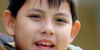 <p>Imagem mostra o menino Iruan quando tinha 8 anos e era alvo de disputa diplom&aacute;tica</p>  Foto: AP