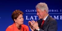 Presidente Dilma Rousseff no seminário com o ex-presidente dos Estados Unidos, Bill Clinton  Foto: Antonio Lacerda / EFE