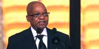 O presidente-sul-africano, Jacob Zuma, discursa durante a cerimônia em homenagem a Mandela  Foto: AFP