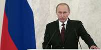O presidente russo, Vladimir Putin, discursa à nação no Kremlin, em Moscou  Foto: AP