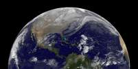 <p>Imagem de satélite mostra o continente americano em dezembro de 2013</p>  Foto: Nasa / Divulgação