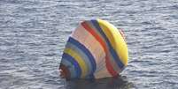 Balão onde estava o chinês que tentava pousar em território disputado com o Japão  Foto: AP