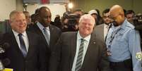 Rob Ford sorri após registrar sua candidatura na prefeitura de Toronto nesta quinta  Foto: AP
