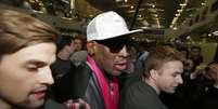 Rodman foi fotografado durante escala em Pequim, a caminho da Coreia do Norte  Foto: Reuters