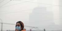 <p>Poluição do ar cobre a cidade de Pequim</p>  Foto: AFP