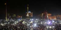 Manifestantes antigoverno se reuniram no centro de Kiev, nesta sexta-feira  Foto: Reuters