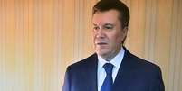 <p>O presidente ucraniano Viktor Yanukovytch alertou para um "banho de sangue" caso Ucrânia não retire tropas ao leste do país</p>  Foto: AFP