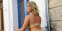 <p>Laura Keller aprovou fantasia que usará na Marquês de Sapucaí</p>  Foto: Daniel Ramalho / Terra