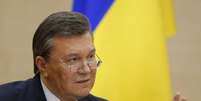 <p>Presidente deposto da Ucrânia Viktor Yanukovich durante coletiva de imprensa na cidade de Rostov-on-Don, no sul da Rússia. Yanukovich, em sua primeira aparição em público desde que foi deposto do cargo de presidente da Ucrânia, disse nesta sexta-feira, 28, na Rússia que não vai desistir de lutar pelo futuro de seu país</p>  Foto: Maxim Shemetov / Reuters