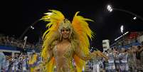 <p>Milena usou uma fantasia comportada no desfile da Águia de Ouro, em São Paulo</p>  Foto: AFP