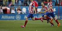<p>Gabi fez um dos gols do Atlético</p>  Foto: EFE