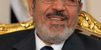 Presidente deposto do Egito Mohamed Mursi durante encontro com o presidente palestino em Cairo, em janeiro de 2013  Foto: AFP