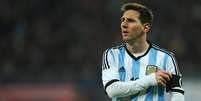 <p>Messi em ação contra a Romênia; argentino tem histórico de passar mal em campo</p>  Foto: Getty Images 