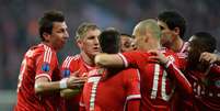 Bayern de Munique comemora gol contra Arsenal e classificação para as quartas da Liga dos Campeões  Foto: AFP