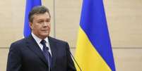 <p>O presidente ucraniano deposto Viktor Yanukovich participa de uma coletiva de imprensa em Rostov-na-Donu, em 11 de março</p>  Foto: Maxim Shemetov / Reuters
