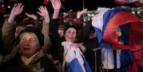 Um mar de bandeiras tricolores russas inundou a praça de Lênin de Simferopol, capital da república separatista da Crimeia  Foto: AP