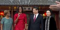 <p>À esquerda, a mãe de Michelle Obama Marian Robinson, ao lado da filha, em visita ao presidente da China Xi Jiping, e sua esposa Peng Liyuan</p>  Foto: Getty Images 
