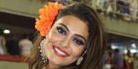 Juliana Paes não desfilou por nenhuma escola de samba em 2014, mas, com uma flor no cabelo, curtiu o Carnaval em um camarote na Sapucaí   Foto: AgNews  