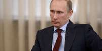 <p>Presidente da Rússia, Vladimir Putin, participa de uma reunião em sua residência nos arredores de Moscou, em 27 de março</p>  Foto: AFP