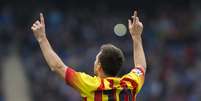 Messi comemora gol de pênalti que deu vitória ao Barcelona  Foto: EFE