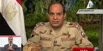 <p>Trecho de vídeo transmitido pela TV estatal egípcia mostra o chefe das Forças Armadas, Abdel Fattah al-Sisi, fazendo um discurso em nível nacional, em que anuncia sua renúncia para ser candidato a presidência do país, em 26 de março</p>  Foto: AP