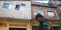 <p>Cena da ocupação do Complexo da Maré (foto de arquivo)</p>  Foto: Mauro Pimentel / Terra