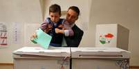 Os colégios eleitorais abriram neste domingo na Hungria para que os mais de 8 milhões de eleitores decidam se dão um novo mandato ao primeiro-ministro, Viktor Orbán  Foto: Laszlo Balogh  / Reuters
